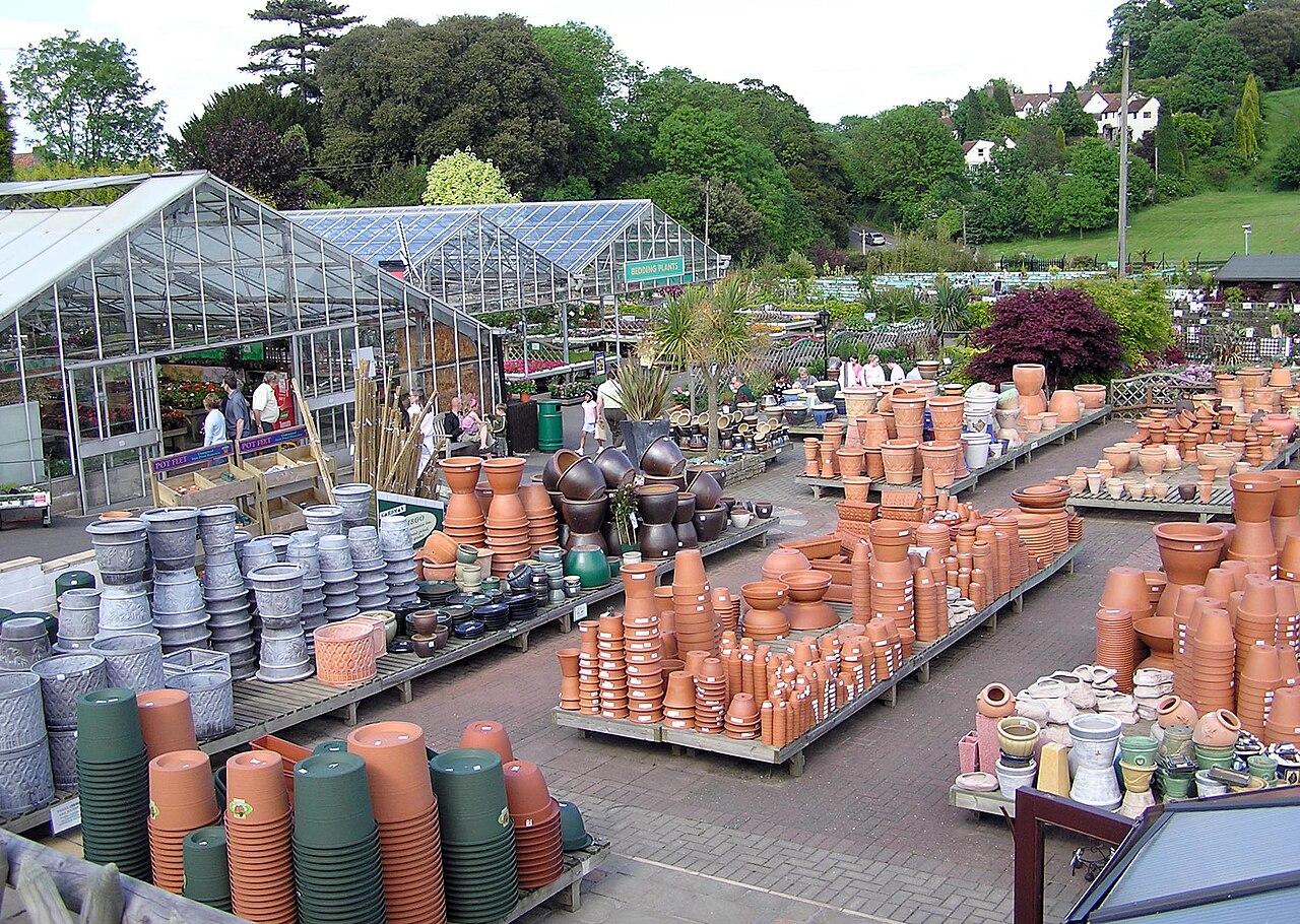 Stacks of terracotta and plastic pots in many sizes at a garden centre